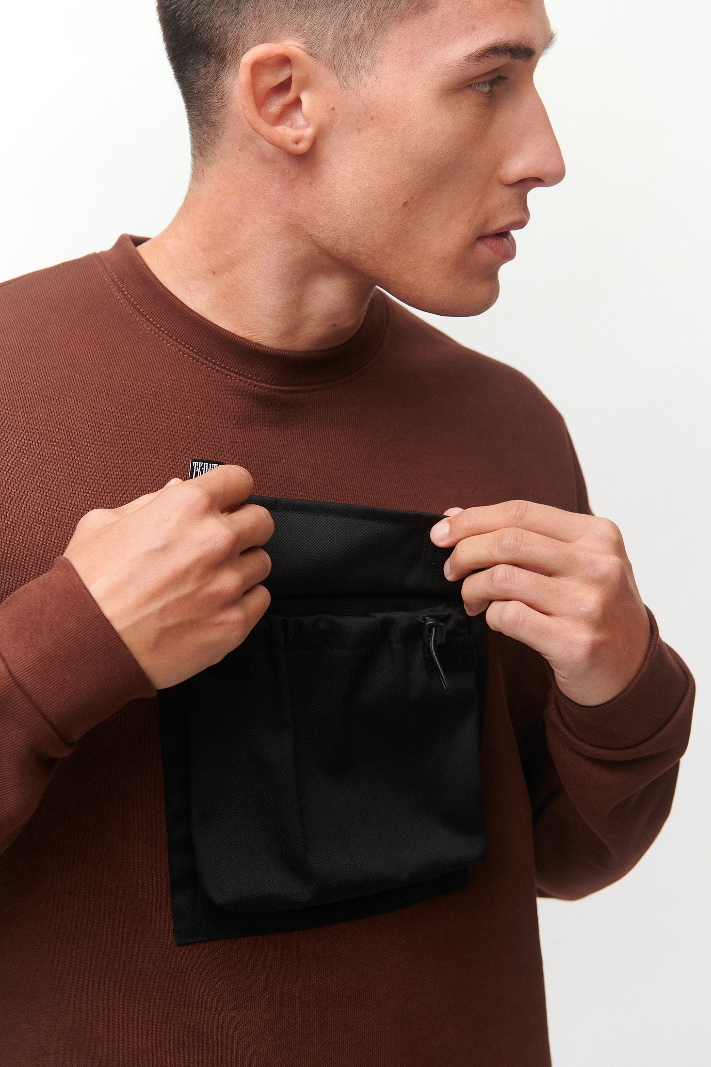 THE UTILITY POCKET CREWNECK